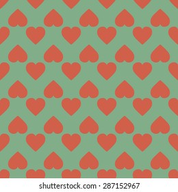 Seamless pattern of hearts in pastel colors.