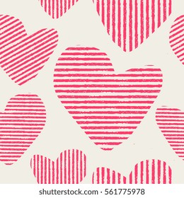 Seamless pattern with hearts in pink on cream background.