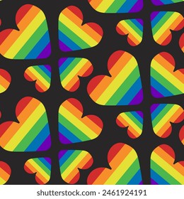 Seamless pattern with hearts in rainbow colors on black background. Peaceful and equality concept. Vector hand drawn illustration for Pride month