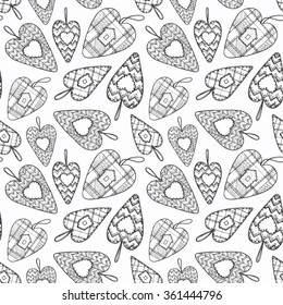 Seamless pattern from the hearts sewed from rags of fabric.Patchwork.Devoted to St. Valentine's Day.Background in vector.
