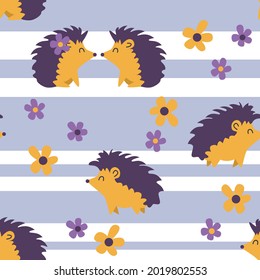 Seamless pattern of hedgehogs and flowers. Vector graphics.
