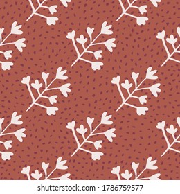 Seamless pattern with herbal silhouettes in pastel light tone. Coral backdrop with dots. Decorative backdrop for wallpaper, wrapping paper, textile print, fabric. Vector illustration.