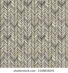 Seamless pattern of herringbone hand drawn chevron style with scandinavian tribal watercolor background for fashion and textile print..