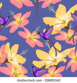 Seamless pattern with hibiscus flowers and hummingbird on blue background. Can be used for wallpaper, wrapping paper,Â decorating of textiles, web background
