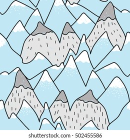 Seamless pattern of hills and cliffs. Pattern in the Scandinavian style. Drawing by hand. Baby children. High mountains with snowy peaks.