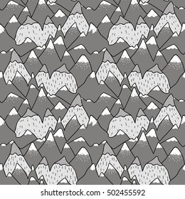 Seamless pattern of hills and cliffs. Pattern in the Scandinavian style. Drawing by hand. Baby children. High mountains with snowy peaks.