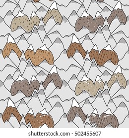 Seamless pattern of hills and cliffs. Pattern in the Scandinavian style. Drawing by hand. Baby children. High mountains with snowy peaks.