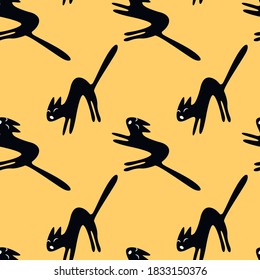 Seamless pattern with hissing angry black witch cat. Happy Halloween. Textured background for greeting card, invitation, party poster, banner