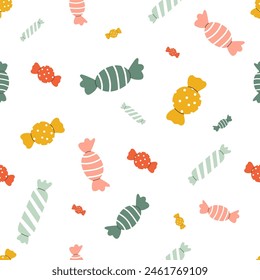 Seamless pattern with holiday candies in cute doodle style. Baby design with holiday clipart for wrapping paper, print, fabric, scrapbook. Bright festive background