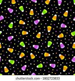 Seamless pattern for the holiday Halloween with candies and sweets. Sugar lollipops of corn grains and candy dots on a black background. The traditional colors of the holiday are orange, green, purple