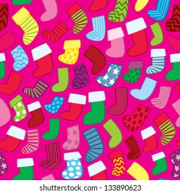 A seamless pattern of holiday stockings in various colors and with different patterns.