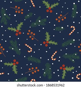 Seamless pattern with holly leaves, berries, caramel canes, sprigs of pine needles, snowflakes. Christmas and New Year design.