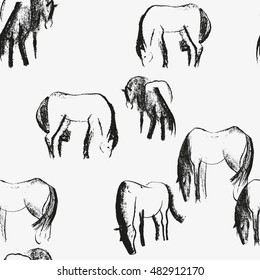 Seamless pattern with horses. Hand drawn background.