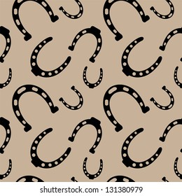 seamless pattern of horseshoe silhouettes on the beige background vector