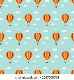 seamless pattern hot air balloon clouds birds sky on blue background vector wallpaper textile giftwrap