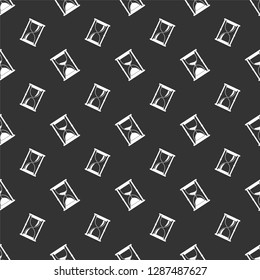 Seamless pattern with hourglass icon. Time measurement. Old fashioned sand clock. Flat vector illustration isolated on black background.