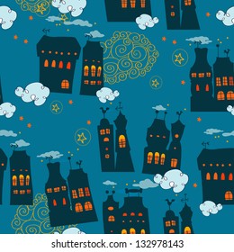 Seamless pattern with houses in the night sky