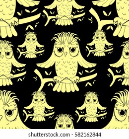 seamless pattern a howlet bird with raised wings on black   vector illustration