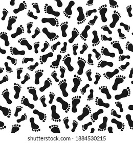 Seamless pattern with human footprints. Black people feet symbol vector illustration.