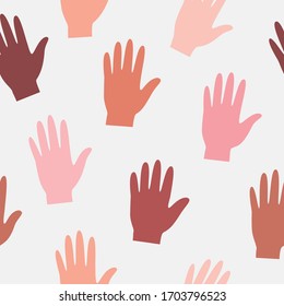 Seamless pattern of human hands. Vector illustration of a set of human hands with different skin colors.