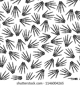 Seamless pattern with human skeleton hand
