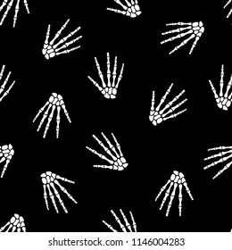 Seamless pattern with human skeleton hand
