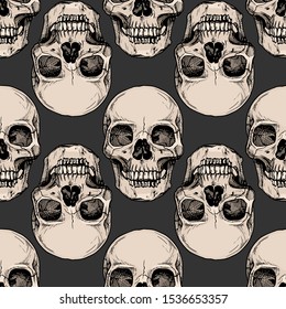 Seamless pattern with human skull. Vector illustration in vintage engraved style.
