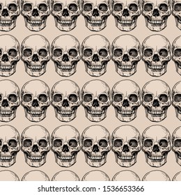 Seamless pattern with human skull. Vector illustration in vintage engraved style.