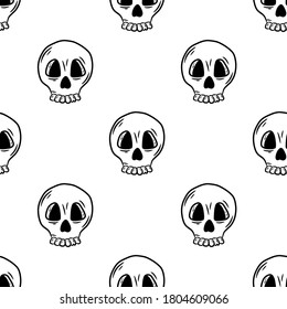 Seamless pattern with human skulls. Hand drawn vector illustration in doodle style on a white background.