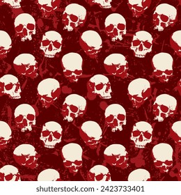 Seamless pattern with human skulls with stains and blood spatters. Vector background with sinister smiling skulls in retro style. Graphic print for clothes, fabric, wallpaper, wrapping paper