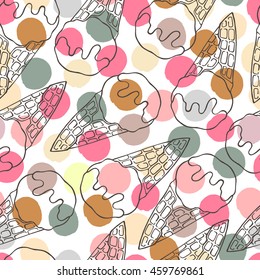 Seamless pattern with ice cream cones on a polka dot background.