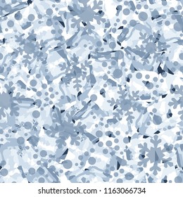 Seamless pattern. Icy mishmash. Winter colors. Snowflakes of different sizes.