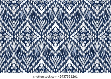 Seamless pattern. ikat, hand drawing ethnic white and blue color, Abstract ogee textured background for textile, wallpaper, carpet, clothing. Traditional bohemian vector illustration.