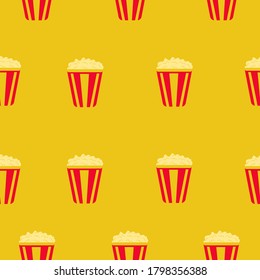 Nahtlose Mustergrafik mit Popcorn auf gelbem Hintergrund