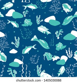 Seamless pattern illustration of underwater corals, whales, rocks, stingray, fish and seaweeds in indigo, aqua and white. Perfect for gifts, background, fabric and scrapbooking.