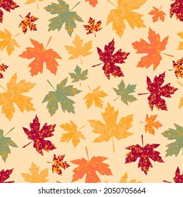 seamless pattern with the image of autumn maple leaves, made in a unique style using texture.