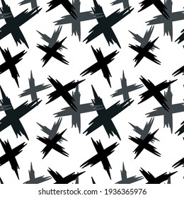 Seamless pattern with the image of black and gray crossed paint smears. Print for paper, textiles and decor.
