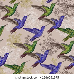 Seamless pattern with the image of blue and green hummingbirds on a background of flowers.