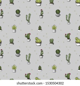 Seamless pattern with the image of cacti. handwork. grey background