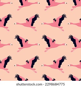Seamless pattern with the image of flamingo birds. Vector illustration on a bright background.