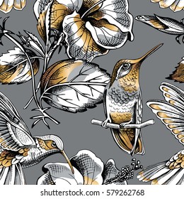 Seamless pattern with image gold Hummingbird and Hibiscus flowers on a dark gray background. Vector illustration.