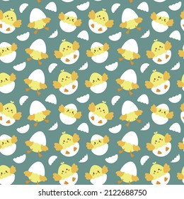 Seamless pattern with the image of newborn chickens in an eggshell. Easter design. Design for paper, textile and decor. Vector illustration.