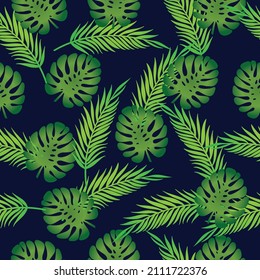 Seamless pattern with the image of palm leaves and monstera.