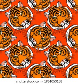 seamless pattern with the image of a tiger's face. Decor for decoration of textiles or wallpaper.