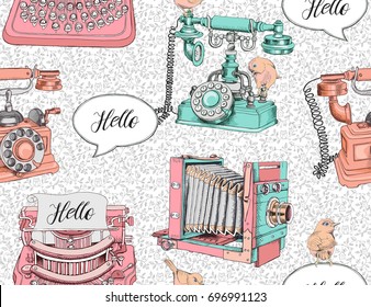 Seamless pattern with image of a vintage Telephone, Camera, Typewriter and birds on a decorative floral background. Vector illustration.