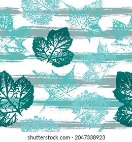 Seamless pattern with imprint forest leafs. Foliage. Mixed media artwork.