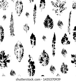 Seamless pattern with imprint leafs on white background. floral seamless pattern for fabric, wallpaper, pattern fills, web page background, surface textures. 