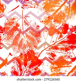 Seamless pattern with imprints of the leaves. Bright watercolor repetition texture. Summer or autumn design.