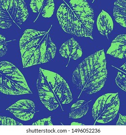 Seamless pattern with imprints of the leaves of trees. Endless texture for the design of nature, fabric, decorative background. Vector stock illustration.
