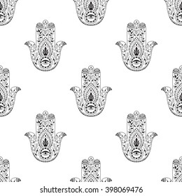 Seamless pattern with indian hand drawn hamsa. Henna tattoo with ethnic ornament. Black and white  background. Illustration in zentangle style. 